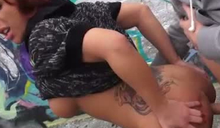 Trashy streetwalker getting nailed hard in a doggy position outdoor