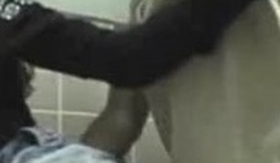 Messy dilettante slut sucking and fucking in a public toilet